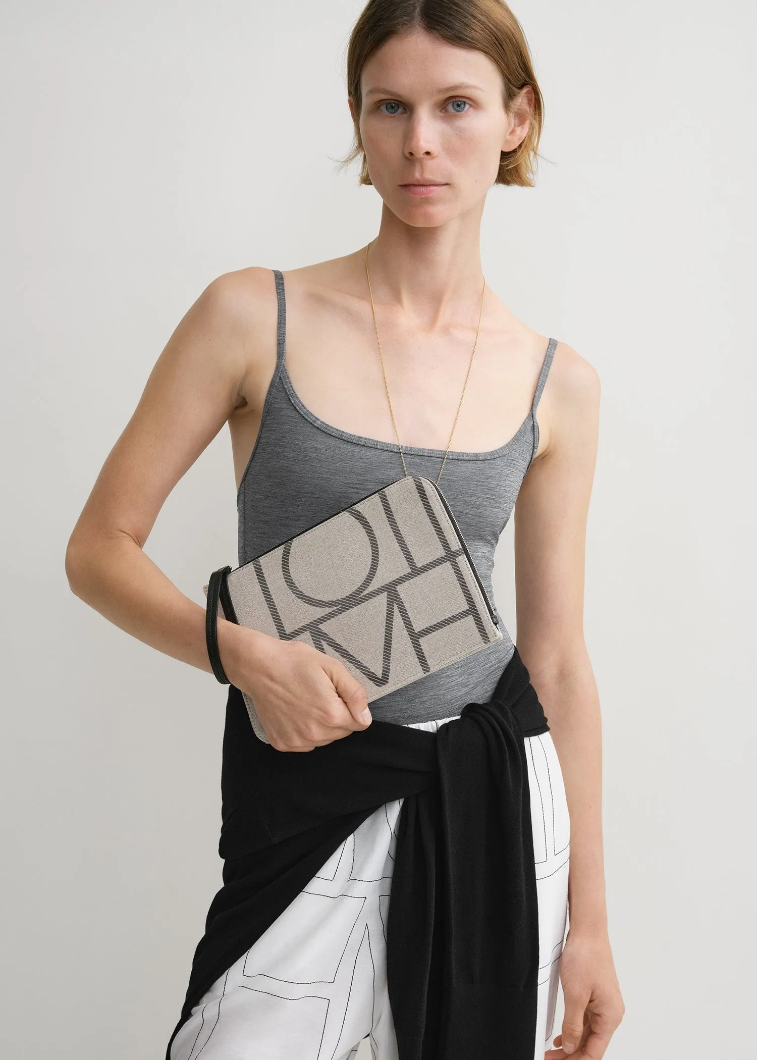 Monogram travel pouch ecru